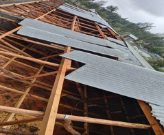 Classroom roof damaged by the storm, July 2022